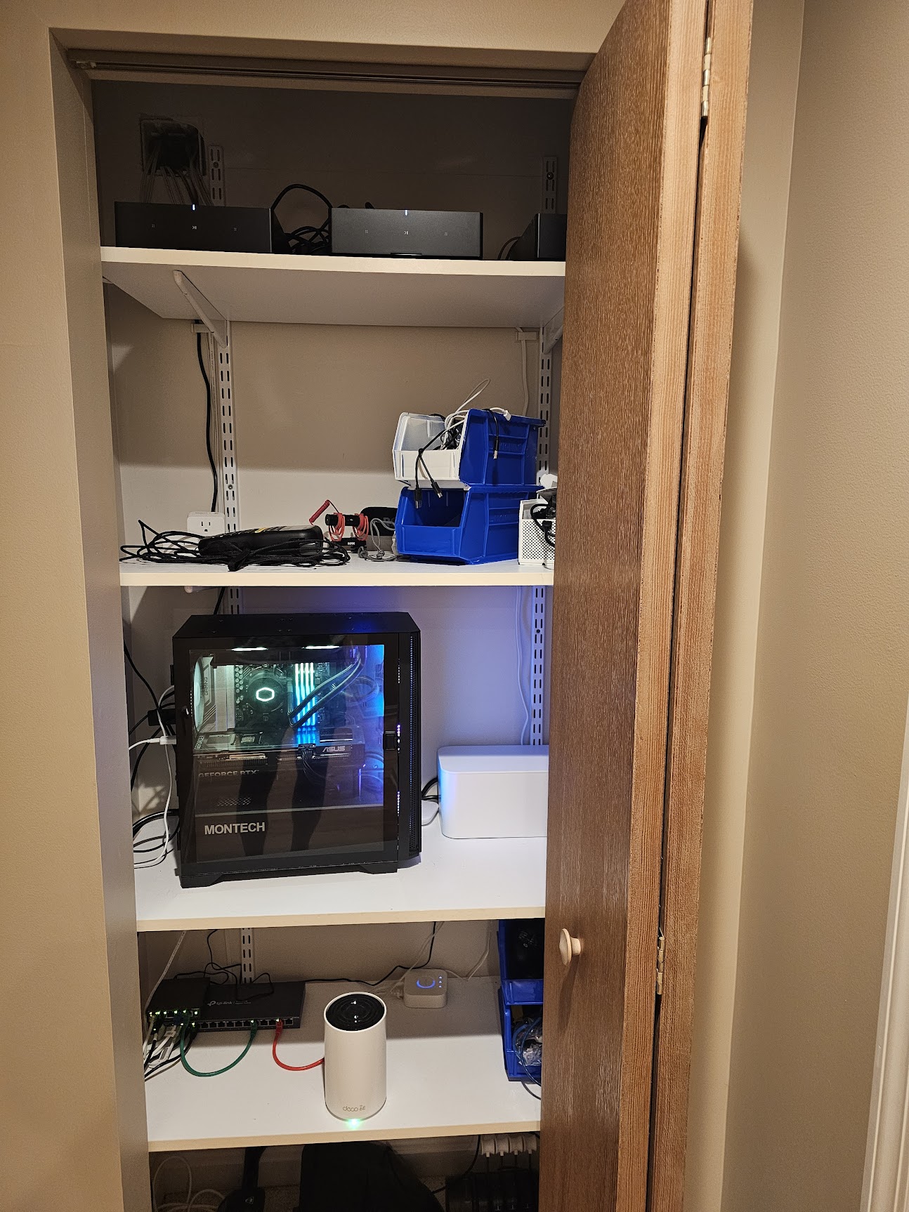 Gaming PC and networking equipment in closet